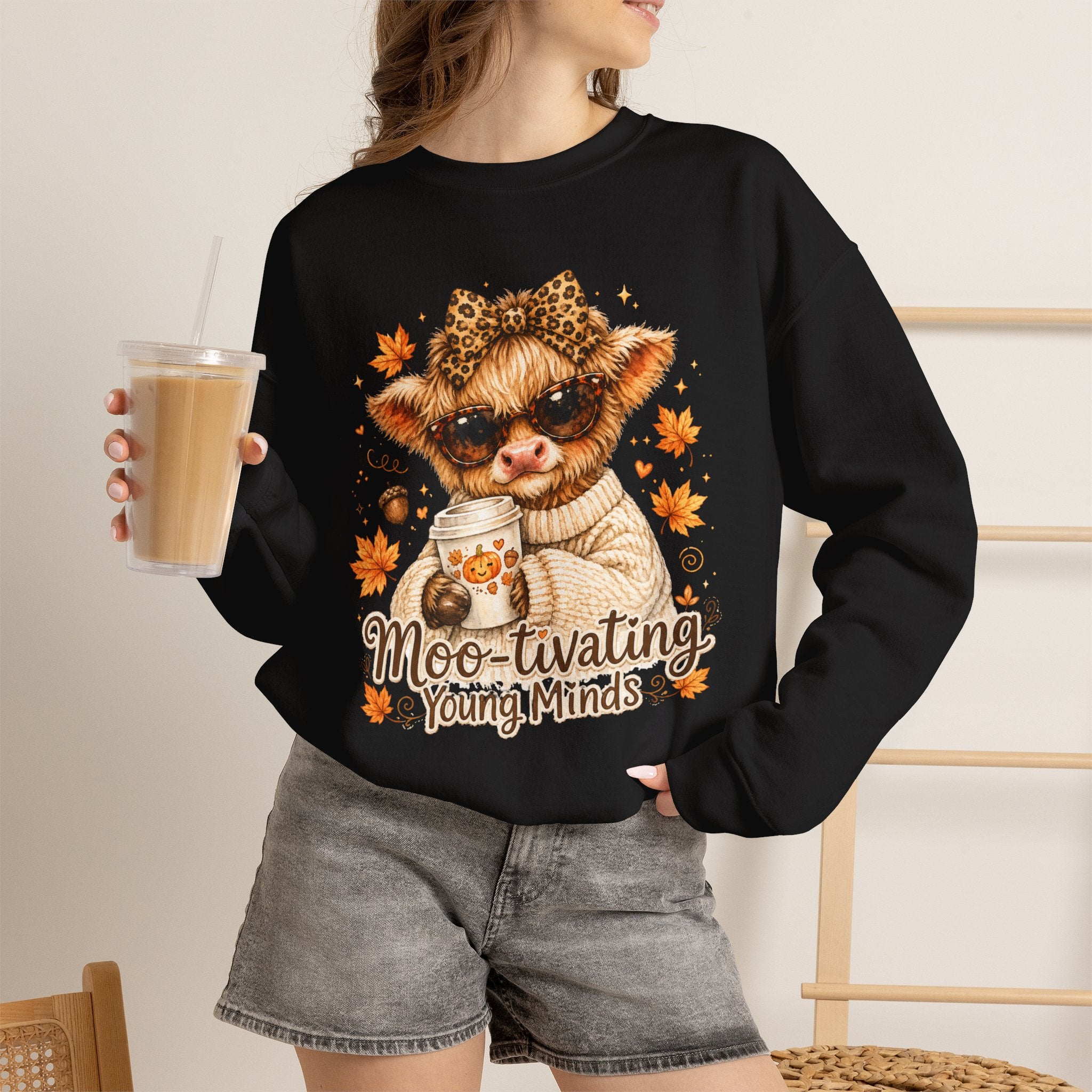 Moo-tivating Young Minds Sweatshirt | Cute Highland Cow Teacher Crewneck